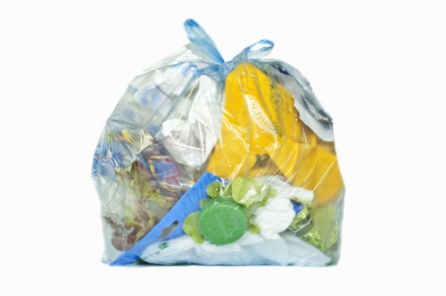 Collection van outside an Erith commercial premises with recycling bins